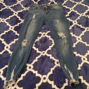 light blue high rise ripped jeans